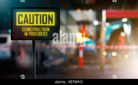 LED Display - CAUTION Construction In Progress Signage Stock Photo