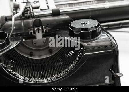 Old manual typewriter machine fragment, black and white photo with soft selective focus Stock Photo