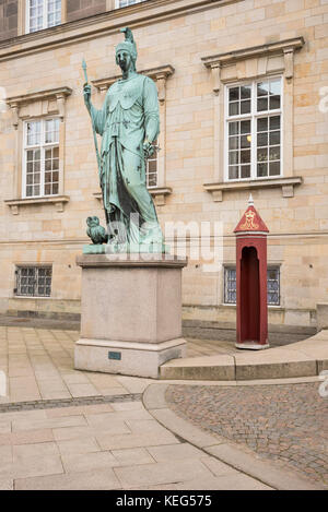 Statue of Minerva at Christiansborg palace , in Roman mythology, is the goddess of war, civilization, wisdom, etc. She is often depicted with an owl,  Stock Photo