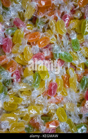 multi-colored candies in plastic wrappers Stock Photo