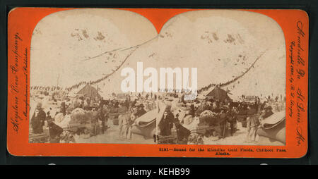 Bound for the Klondike gold fields, Chilkoot Pass, Alaska, by Keystone View Company Stock Photo