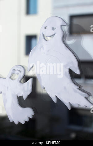 Halloween chidren's party toy ghost levitating flying in the air. Stock Photo