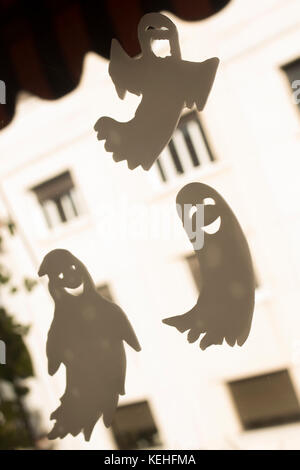 Halloween chidren's party toy ghost levitating flying in the air. Stock Photo