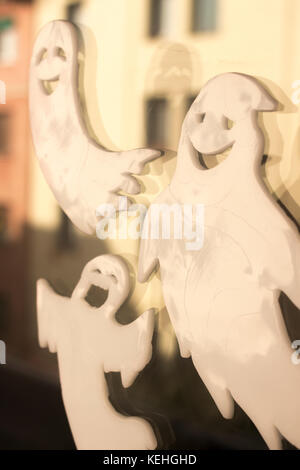 Halloween chidren's party toy ghost levitating flying in the air. Stock Photo