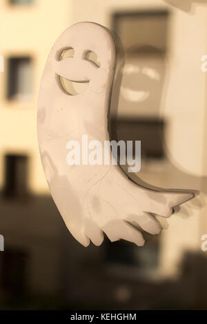 Halloween chidren's party toy ghost levitating flying in the air. Stock Photo