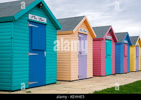 Colourful beach huts, Amble, Northumberland, England, UK Stock Photo