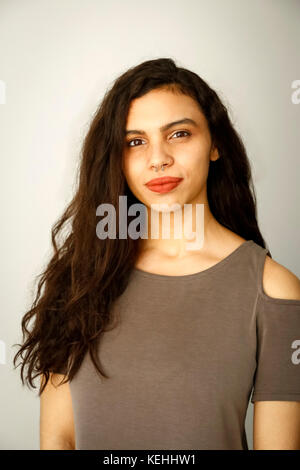 Portrait of mixed race woman with nose ring Stock Photo