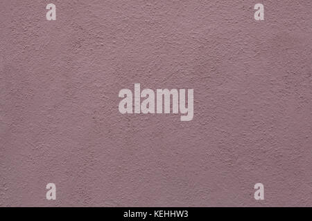 Dirty pink painted stucco wall. Background texture. Stock Photo
