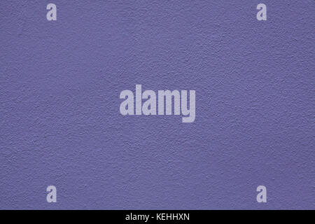 Purple painted stucco wall. Background texture. Stock Photo
