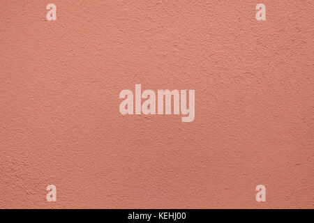 Pink painted stucco wall. Background texture. Stock Photo