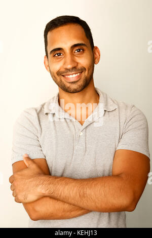 Portrait of smiling mixed race man Stock Photo