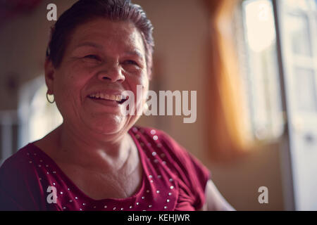 Smiling Hispanic woman Stock Photo