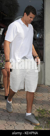 MIAMI BEACH, FL - MAY 14: Kim Kardashian has lunch  with boyfriend Kris Humphries and straphanger PR wanna be Jonathan Cheban. Humphries was quite the gentleman as he opened the door for his future bride  on May 14, 2011 in Miami Beach, Florida.   People:  Kim Kardashian Kris Humphries  Transmission Ref:  FLXX    Credit: Hoo-me.com/MediaPunch Stock Photo