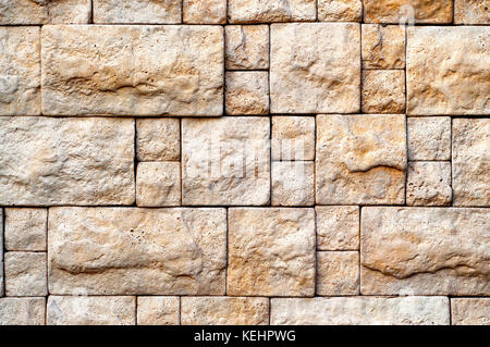 Decorative Bege Stone Random Size Brick Wall Texture For Your Design. Stock Photo
