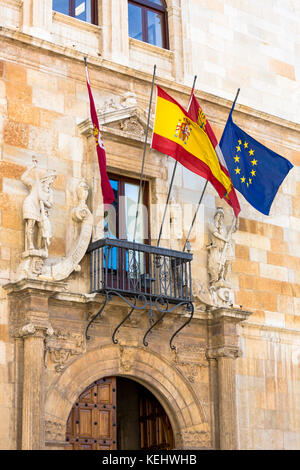 European Union and Spanish flag at 16th Century Palacio de los Guzmanes by Rodrigo Gil de Hontanon in Leon, Castilla y Leon, Spain Stock Photo