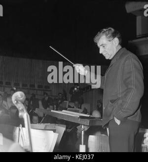 Conductor Leonard Bernstein in rehearsals with the New York Philharmonic Orchestra on 13th February 1963. Leonard Bernstein (August 25, 1918 – October 14, 1990) was an American composer, conductor, author, music lecturer, and pianist. He was among the first conductors born and educated in the US to receive worldwide acclaim. According to music critic Donal Henahan, he was 'one of the most prodigiously talented and successful musicians in American history. Stock Photo