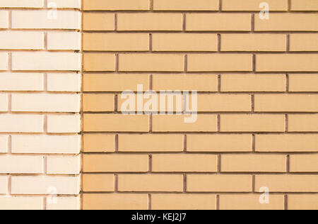 A new wall of brown and white brick for the background. Stock Photo