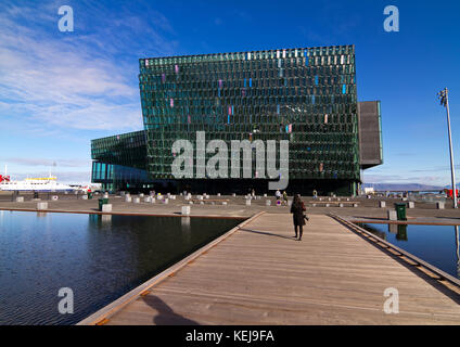 Harpa concert hall and conference center in Reykjavík, Iceland. The building features a distinctive colored glass, inspired by the basalt landscape Stock Photo