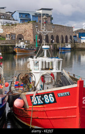 Fishing boats in Seahouses harbour on the Northumbrian coast, Northumberland, England, UK Stock Photo
