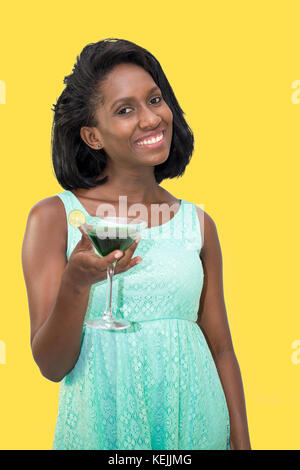 Pretty lady smiling with cocktail Stock Photo