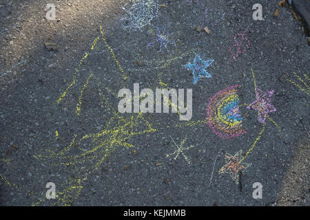 Child's chalk drawing on a sidewalk in Prospect Park, Brooklyn, NY. Stock Photo