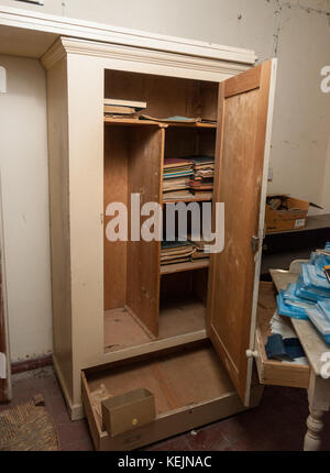 Doctor office with log books from 1957 in abandoned sanatorium - hospital room Stock Photo