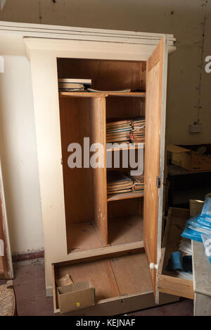 Doctor office with log books from 1957 in abandoned sanatorium - hospital room Stock Photo