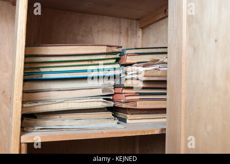 Doctor office with log books from 1957 in abandoned sanatorium - hospital room Stock Photo