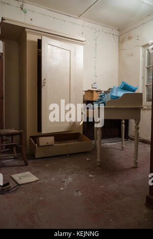 Doctor office with log books from 1957 in abandoned sanatorium - hospital room Stock Photo