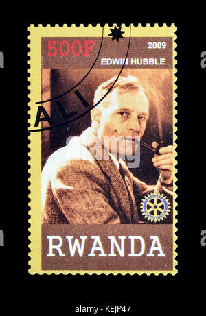 Cancelled postage stamp printed by Rwanda, that shows Edwin Hubble. Stock Photo