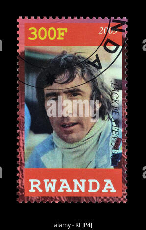 Cancelled postage stamp printed by Rwanda, that shows Jackie Stewart. Stock Photo