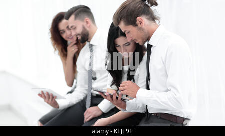 Business workers using a digital tablet. Stock Photo