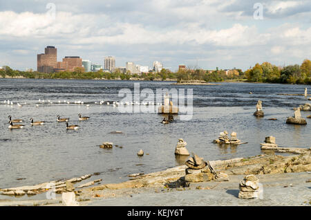 2017 Inukshuks: For more then 30 years Inukshuks, or balanced rock sculptures, have been at Remics Rapids on the Ottawa River just west of downtown Ot Stock Photo