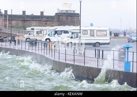 New Brighton, Wirral, UK. 22nd Oct, 2017. Holidaymakers in camper vans are undeterred, as strong wind and heavy rain hit a deserted New Brighton, on the Wirral peninsula, following storm Brian. Credit: Paul Warburton/Alamy Live News Stock Photo