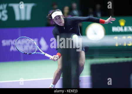 Spanish tennis player Garbine Muguruza is in action during her first round robin match of the WTA Finals vs Latvian tennis player Jelena Ostapenko on Oct 22, 2017 in Singapore, Singapore - ©Yan Lerval/Alamy Live News Stock Photo