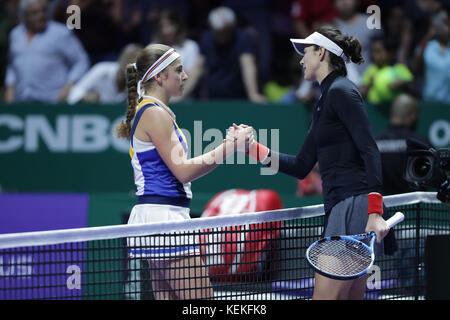 Spanish tennis player Garbine Muguruza is in action during her first round robin match of the WTA Finals vs Latvian tennis player Jelena Ostapenko on Oct 22, 2017 in Singapore, Singapore - ©Yan Lerval/Alamy Live News Stock Photo