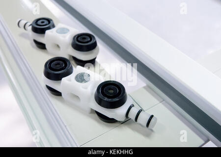 Castors, sliding doors and accessories,on aluminium Stock Photo