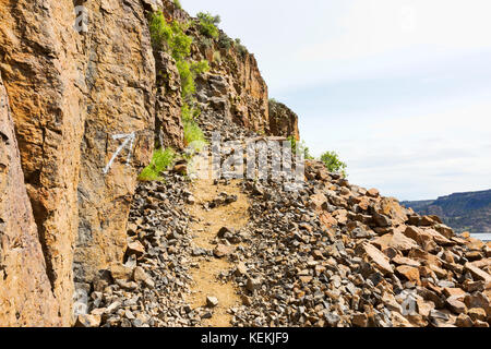 Trail up Steamboat Rock, feature of Steamboat Rock State Park on the shore of Banks Lake, a reservoir in Eastern Washington State along the Coulee Cor Stock Photo