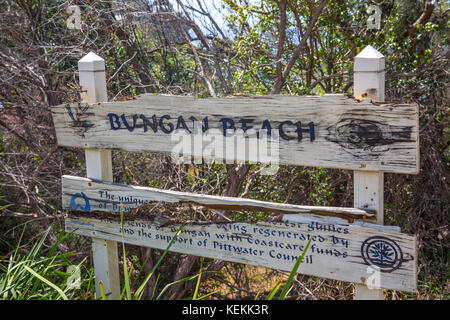 Timber sign at the approach track to Bungan beach in the suburb of Newport on Sydney northern beaches,New South Wales,Australia Stock Photo