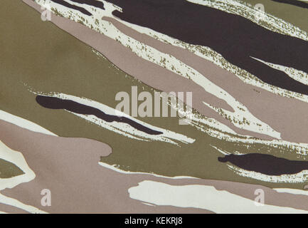Camouflage pattern on fabric background. Stock Photo