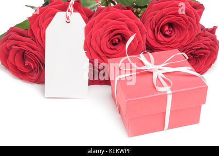 Card, box and roses on white  Stock Photo