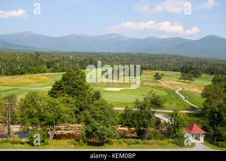 View of the golf course and mountains behind the Omni Mount Washington Resort, Bretton Woods, New Hampshire, United States Stock Photo