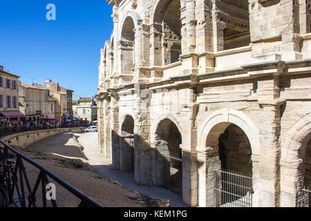 The Arles Amphitheatre (Arenes d'Arles in French), a two-tiered Roman amphitheatre in the southern France town of Arles. A World Heritage Site since 1 Stock Photo