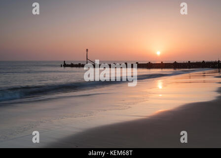 Sunrise at Walcott, on the Norfolk coast. Stock Photo