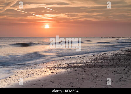 Sunrise at Walcott, on the Norfolk coast. Stock Photo