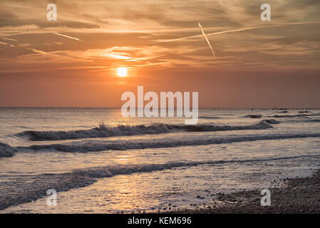 Sunrise at Walcott, on the Norfolk coast. Stock Photo