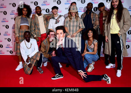 Rita Ora (centre back) and Nick Grimshaw (front) attending BBC Radio 1's Teen Awards, at the SSE Arena, Wembley, London. Stock Photo