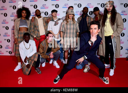 Rita Ora (centre back) and Nick Grimshaw (front) attending BBC Radio 1's Teen Awards, at the SSE Arena, Wembley, London. Stock Photo