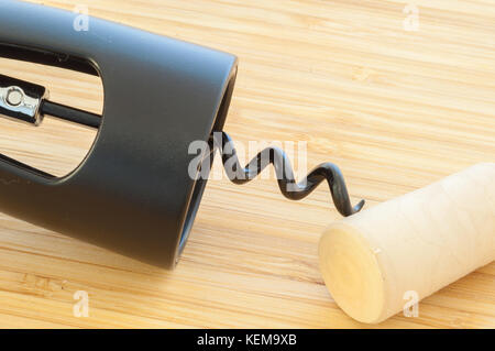 beautiful raw corkscrew on cutting board Stock Photo