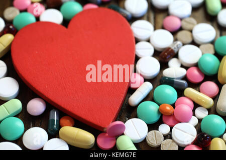 Multicolored tablets of different shapes and sizes Stock Photo